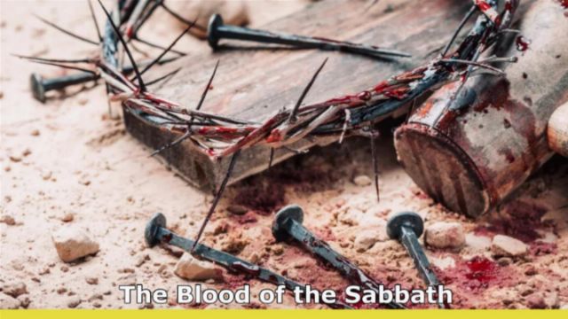 An image depicting a crown of thorns and a wooden hammer lying on sandy ground, surrounded by scattered nails and stains of blood. There is text at the bottom reading &ldquo;The Blood of the Sabbath.&rdquo; Opens a new window with the video.