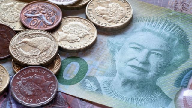 A collection of Australian currency featuring coins and a banknote with an image of Queen Elizabeth II. Coins display various animals including a kangaroo and other symbols. Opens a new window with the video.