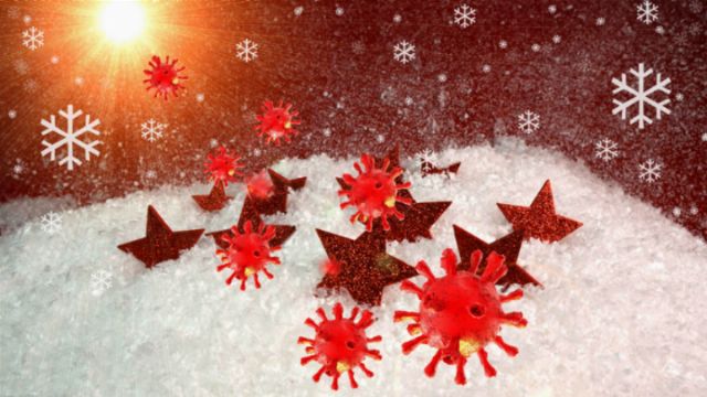 A stylized illustration showing red and copper colored star-like shapes and spherical figures with spike details scattered across a snowy landscape. Snowflakes drift gently in the background, illuminated by a bright light reminiscent of a star, suggesting a celestial scenario. Opens a new window with the video.