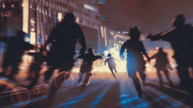 Silhouettes of several individuals running urgently through an urban street illuminated by intense, almost celestial light, creating elongated shadows and a dynamic, fast-paced scene. Opens a new window with the video.
