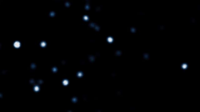 A celestial view capturing a cluster of stars in the cosmos, glowing brightly against the backdrop of deep space. Opens a new window with the video.