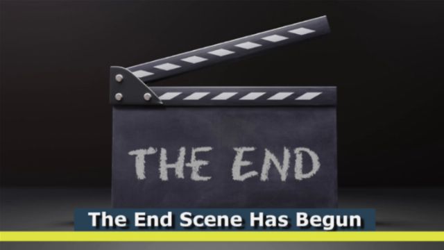 A black movie clapperboard with white text reading &ldquo;THE END&rdquo; positioned in front of a dark gray background. The board is slightly ajar, suggesting the close of a scene. Opens a new window with the video.