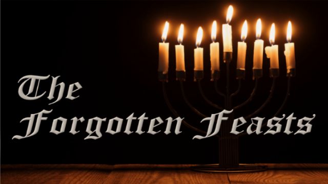 A Menorah with glowing candles is displayed prominently, with the words &ldquo;The Forgotten Feasts&rdquo; artistically rendered above it. The background is dark, highlighting the light from the candles. Opens a new window with the video.