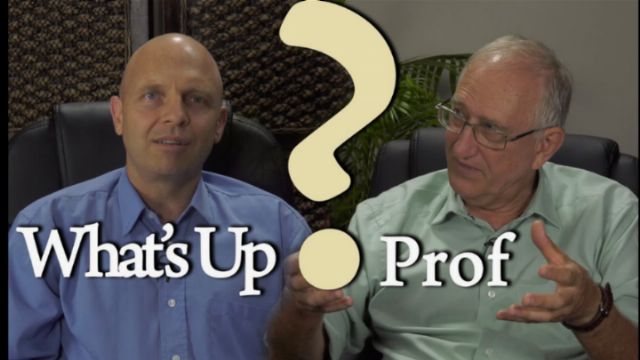 Two men sitting in an office environment, one bald and the other wearing glasses, engaging in a discussion next to a large question mark graphic with the text &ldquo;What's Up Prof&rdquo; visible. Opens a new window with the video.