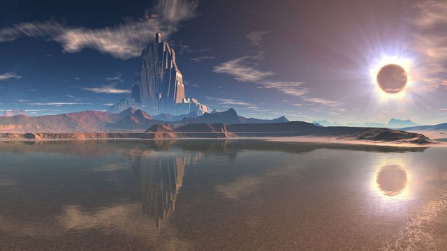 A surreal landscape depicting a large, futuristic mountain structure under a clear sky with clouds, next to a calm lake reflecting the structure and the surrounding terrain. An eclipsed sun, resembling a celestial event, casts a gentle glow over the scene, evoking a sense of serene isolation. Opens a new window with the video.