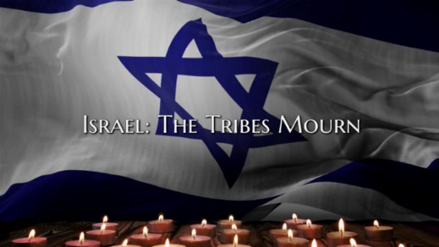 A representation showing a digital image of an Israeli flag, waving, with a prominent blue Star of David in the center. Beneath the flag is a row of burning candles, adding a solemn atmosphere. The caption &ldquo;ISRAEL: THE TRIBES MOURN&rdquo; is overlaid on the flag. Opens a new window with the video.